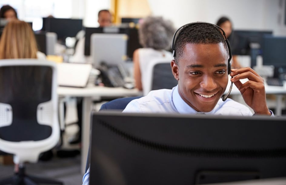 Employee on phone in call centre