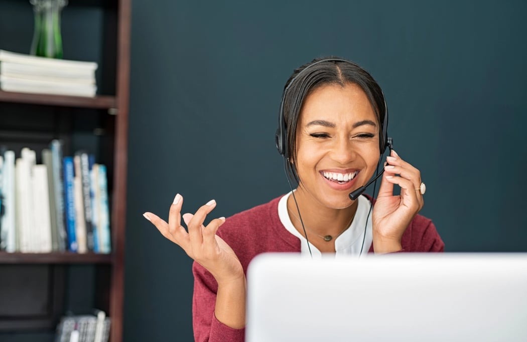 Woman on the phone delivering great customer service
